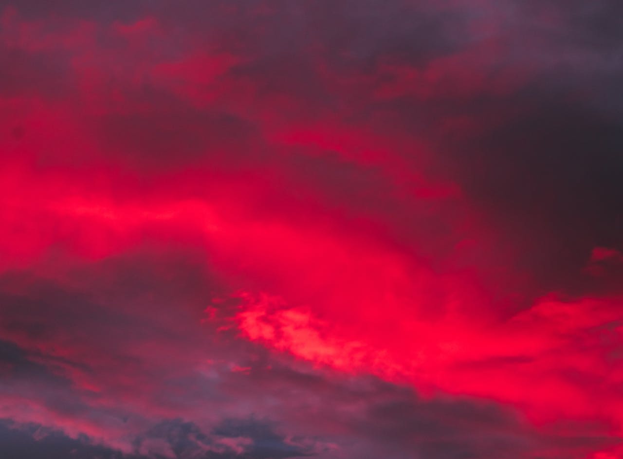 Crafting Captivating Headlines: Your awesome post title goes here Captivating red clouds at dusk creating a dramatic sky scene.